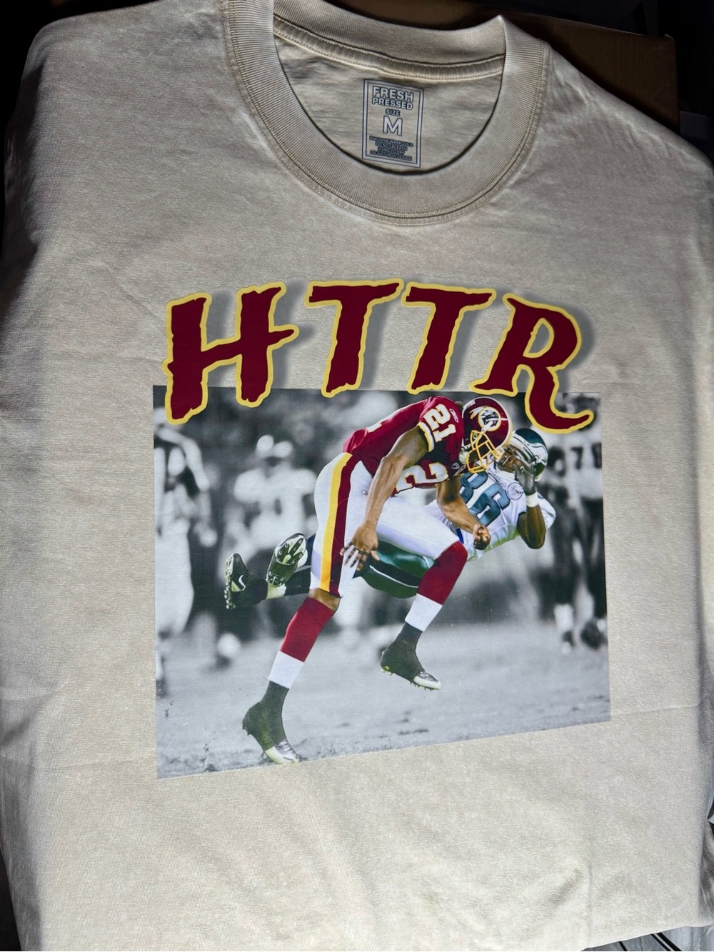 HTTR Sean Taylor “Hit Stick” Graphic Tee - Cream with Burgundy & Gold